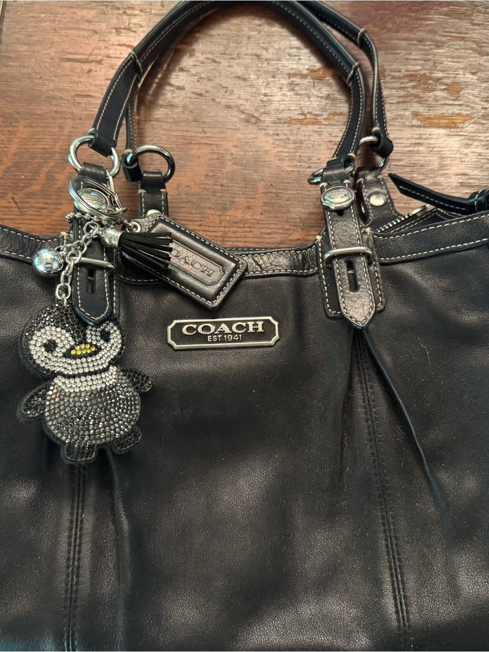Coach Black Leather Shoulder Bag with Crystal Penguin Charm